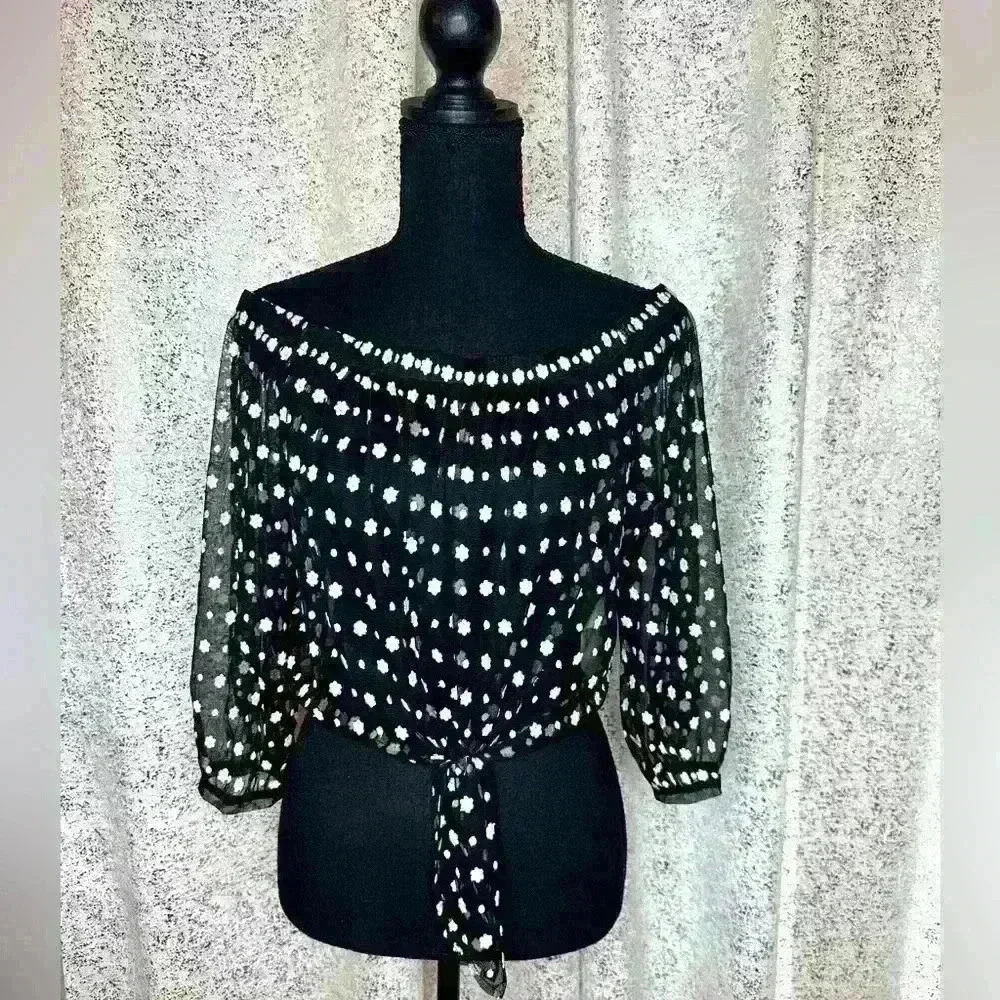 Never worn black stretchy mesh with embroidered white flowers peasant top.